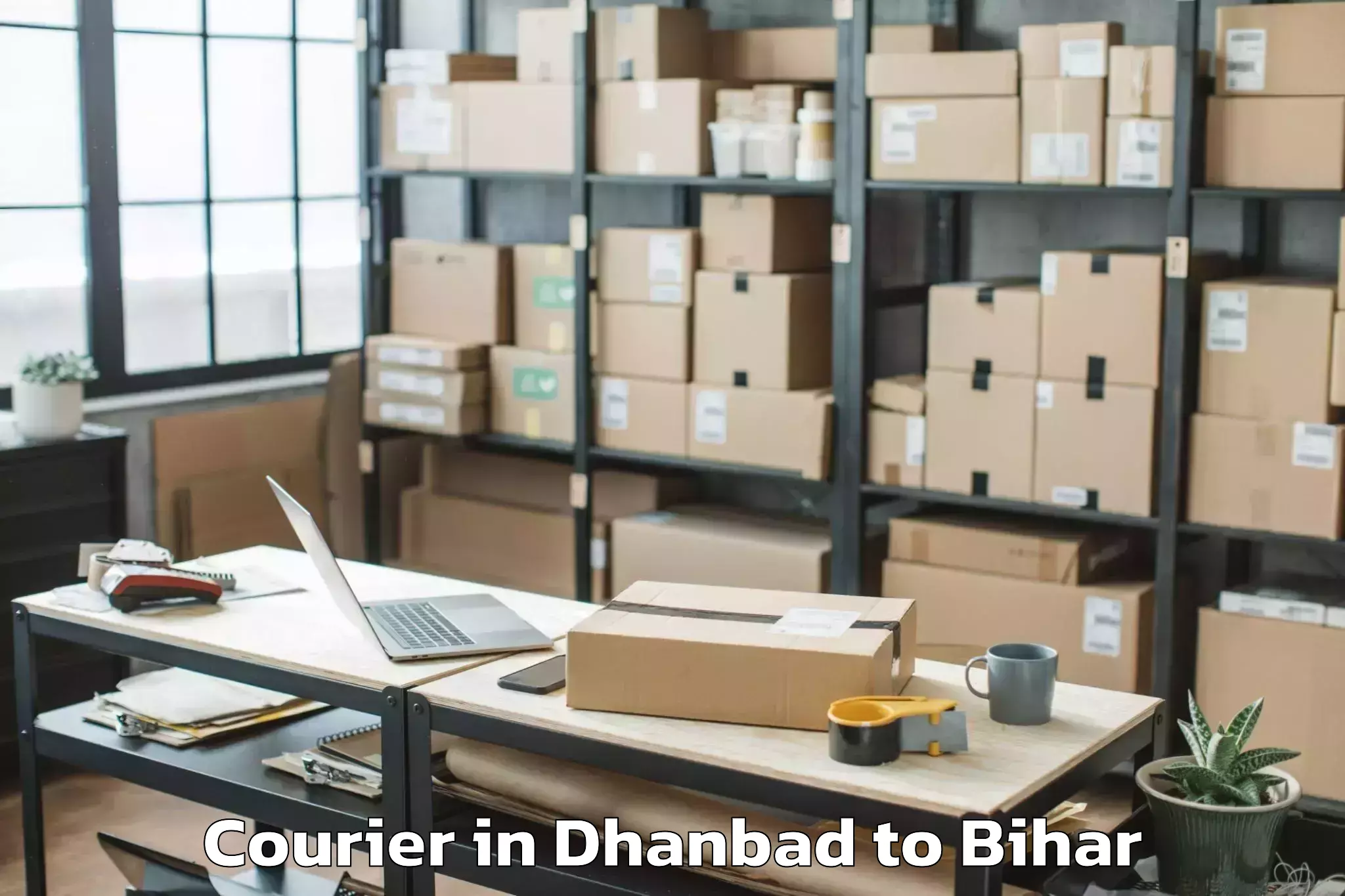 Reliable Dhanbad to Lauria Nandangarh Courier